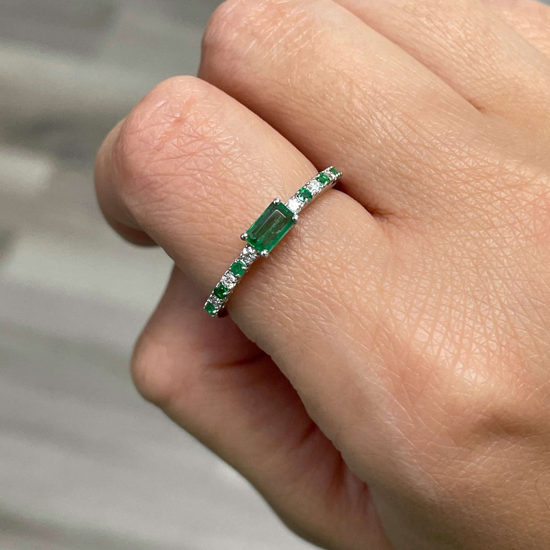 Emerald green stone platinum ring with fine cz -